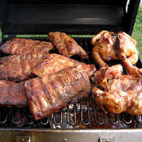 Low and slow ribs and barbecued chicken